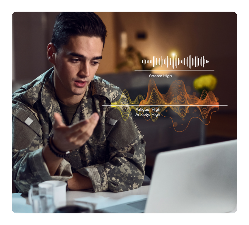 Soldier speaking into a computer with data analysis above him